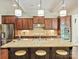 Chef's kitchen with a large island, granite counters, and ample cabinet space at 2030 Gloucester St, Weddington, NC 28104