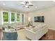 Bright living room with hardwood floors and large windows for natural light at 2030 Gloucester St, Weddington, NC 28104