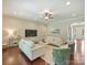 Spacious living room with hardwood floors and comfortable seating at 2030 Gloucester St, Weddington, NC 28104