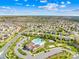 This aerial view highlights the neighborhood's layout, green spaces, and the community pool and playground at 2146 Holden Sw Ave, Concord, NC 28025
