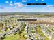 This aerial view shows the home's location, noting that Uptown Charlotte is only a 30 minute drive at 2146 Holden Sw Ave, Concord, NC 28025