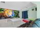 Entertainment room with a big screen and colorful couch at 2146 Holden Sw Ave, Concord, NC 28025