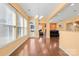 Open-concept dining room filled with light, seamlessly connected to the living area and offering a view of the backyard at 2146 Holden Sw Ave, Concord, NC 28025