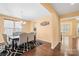 The dining room has natural light, seating for six, and a modern rug at 2146 Holden Sw Ave, Concord, NC 28025