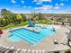 Community pool featuring a play area and plenty of lounge chairs at 2146 Holden Sw Ave, Concord, NC 28025