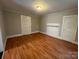 Spacious bedroom with hardwood floors and lots of closet space at 2300 Olando St, Charlotte, NC 28206