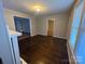 Living room showcasing hardwood floors and neutral paint colors at 2300 Olando St, Charlotte, NC 28206