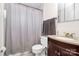 Well-maintained bathroom with vanity, mirror, and shower-tub combination at 2629 Vail Ave, Charlotte, NC 28204