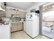 Functional kitchen with ample counter space and adjacent sliding door to deck at 2629 Vail Ave, Charlotte, NC 28204