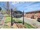 Elegant Cranbrook sign with manicured landscaping in front of brick apartments at 2629 Vail Ave, Charlotte, NC 28204