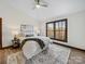 Inviting bedroom with a queen bed, decorative rug, and a large window providing ample natural light at 300 Boyd Rd, Clover, SC 29710