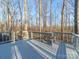 Open deck space with wood railing and forest views at 300 Boyd Rd, Clover, SC 29710