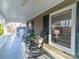 Inviting covered front porch with rocking chairs and charming details at 300 Boyd Rd, Clover, SC 29710