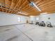 Spacious three car garage with lawn care equipment and storage at 300 Boyd Rd, Clover, SC 29710