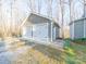 Detached two-car garage with neutral paint color and shingle roofing at 300 Boyd Rd, Clover, SC 29710