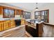Kitchen featuring stainless steel appliances, wooden cabinetry, and a dining area with natural light at 300 Boyd Rd, Clover, SC 29710