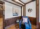 Sitting area with wood beams and trim, plus a round mirror and painting at 300 Boyd Rd, Clover, SC 29710
