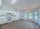 Eat in kitchen with modern appliances, white cabinets, and a bright atmosphere, perfect for casual dining at 3007 Walsingham Ct, Matthews, NC 28105