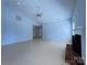 Spacious living room with vaulted ceiling, brick fireplace, and lots of light at 3007 Walsingham Ct, Matthews, NC 28105