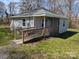 Charming single-story home with ramp, siding, and a well-maintained lawn at 301 Huffman Rd, Gastonia, NC 28056
