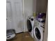 Functional laundry area with washer, dryer, and storage space at 301 Huffman Rd, Gastonia, NC 28056