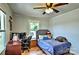 Bedroom featuring a bed, a desk, and a window at 302 Griffith Rd, Monroe, NC 28112