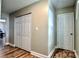Hallway with a closet and wood-look floors at 302 Griffith Rd, Monroe, NC 28112
