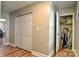 Hallway with a closet and an open storage area at 302 Griffith Rd, Monroe, NC 28112