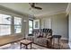 Comfortable living room with ample seating, and natural light that showcase the hardwood floors at 302 Griffith Rd, Monroe, NC 28112