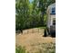 Side view of a house with a fenced-in backyard at 3204 Leah Elizabeth Ln, Monroe, NC 28110