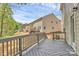 Expansive backyard showing wood decks on multiple homes with neutral siding and well maintained lawns at 3204 Leah Elizabeth Ln, Monroe, NC 28110