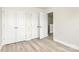 Bedroom with closet doors and entry to another room at 3204 Leah Elizabeth Ln, Monroe, NC 28110