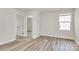 Neutral bedroom featuring neutral paint and wood-look flooring at 3204 Leah Elizabeth Ln, Monroe, NC 28110