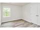 Bedroom featuring light floors, a closet, and a window at 3204 Leah Elizabeth Ln, Monroe, NC 28110