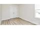 Neutral bedroom featuring neutral paint and wood-look flooring at 3204 Leah Elizabeth Ln, Monroe, NC 28110
