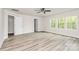 Spacious bonus room has ample natural light and an entry to another room at 3204 Leah Elizabeth Ln, Monroe, NC 28110