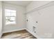 Laundry room with shelving, window and hook-ups at 3204 Leah Elizabeth Ln, Monroe, NC 28110