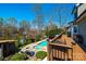 Backyard features an in-ground pool and spa, deck space for lounging and entertaining, and well-maintained landscaping at 3765 11Th Ne St, Hickory, NC 28601