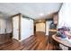 Basement area with lots of storage and doors leading to different rooms, a functional utility corner, and vinyl flooring at 3765 11Th Ne St, Hickory, NC 28601