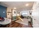 Finished basement with a cozy seating area, playful wooden play structure, and stylish wood-look flooring at 3765 11Th Ne St, Hickory, NC 28601