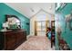 Charming bedroom with a bunkbed, vibrant walls, and a whimsical dinosaur theme creates a fun, imaginative space at 3765 11Th Ne St, Hickory, NC 28601