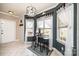 Charming dining nook featuring a round table with bar stools, lots of natural light, and a view of the backyard at 3765 11Th Ne St, Hickory, NC 28601