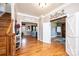 Inviting foyer with hardwood floors, elegant trim, staircase, and access to other rooms at 3765 11Th Ne St, Hickory, NC 28601