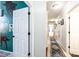 Hallway with fresh paint and hardwood floors, featuring a view to an adjacent room at 3765 11Th Ne St, Hickory, NC 28601
