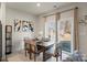 Bright dining area with sliding glass doors and stylish decor for a inviting space at 4104 Armstrong Farm Dr, Belmont, NC 28012