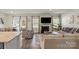 Cozy living room featuring a fireplace, large TV, and comfortable seating arrangement at 4104 Armstrong Farm Dr, Belmont, NC 28012