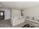 Bright and airy living room featuring plush seating and neutral decor for a relaxing atmosphere at 4104 Armstrong Farm Dr, Belmont, NC 28012