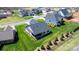 An aerial view shows the layout of the home with the screened in porch and well manicured landscaping at 4210 Holly Ne Cir, Conover, NC 28613