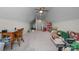 Large bonus room with carpet, ceiling fan and natural light from the window at 4210 Holly Ne Cir, Conover, NC 28613