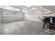 Spacious three car garage with three overhead lights and two garage doors at 4210 Holly Ne Cir, Conover, NC 28613
